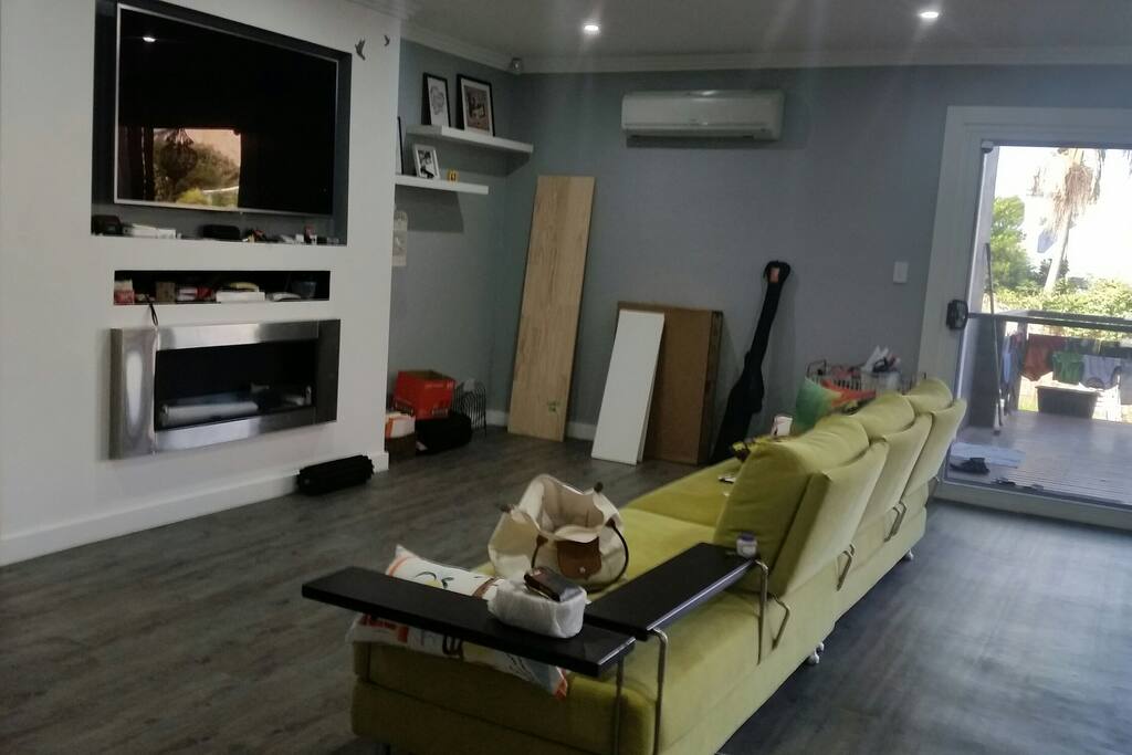 Open concept living room that connects with the dinning