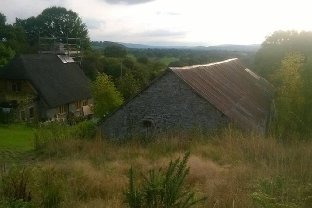 Our thatched cottage and old barn. The annex is the other end of the barn.