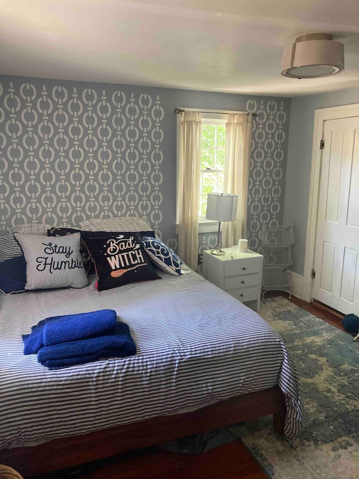 Another photo of the queen size bed. 3 bedroom house.