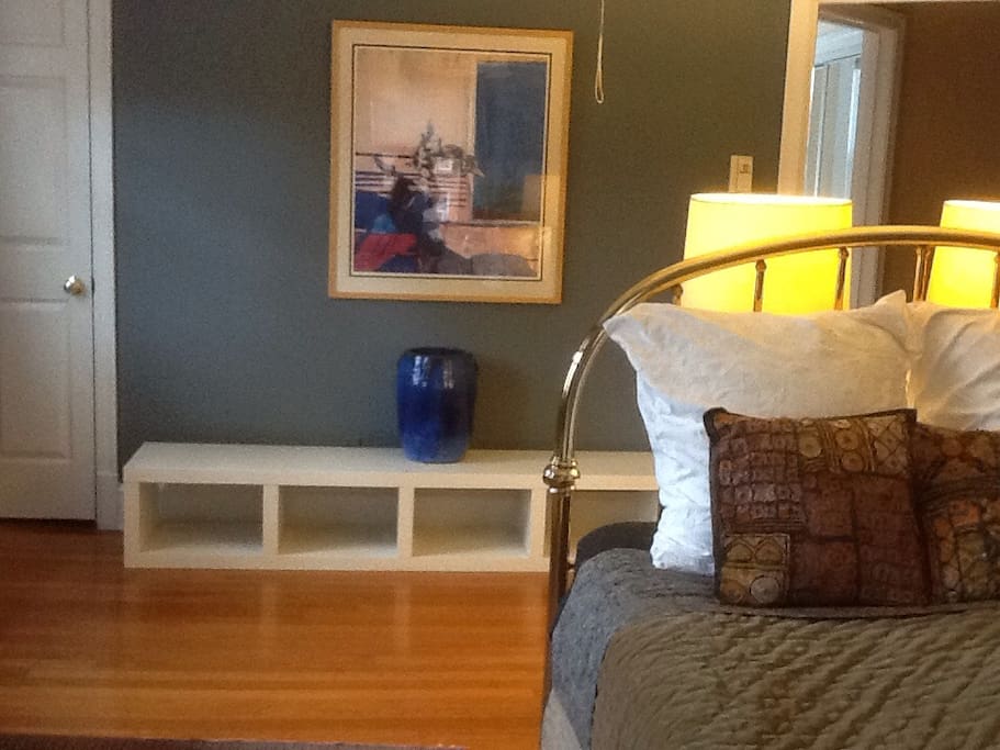 Fine art and a comfortable bed; what more does one need?