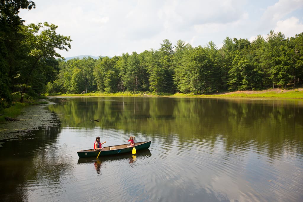 A peaceful lake is one of the pleasures of staying in a Montfair cabin.