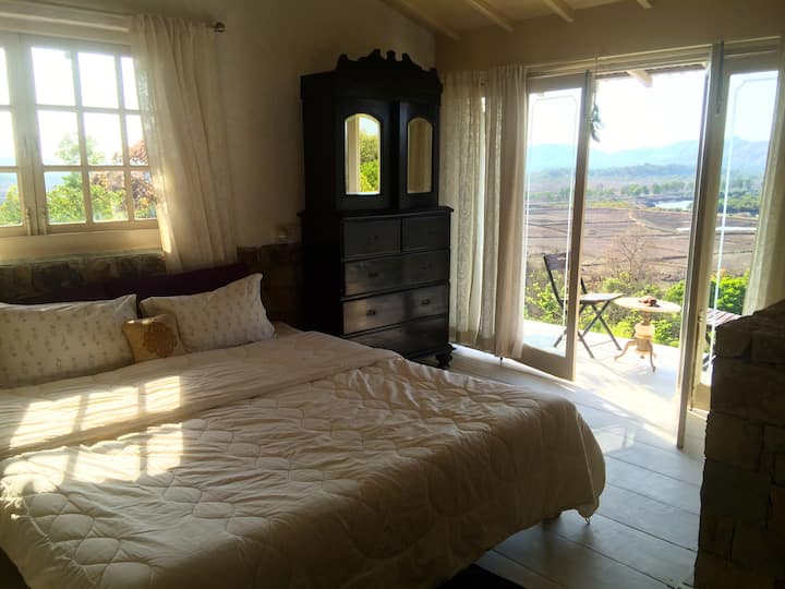 Upper bedroom with en-suite and view. Poolside. 