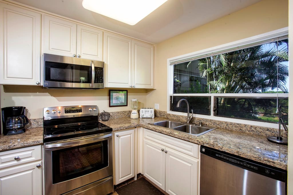 Kitchen with new flooring and update appliances
