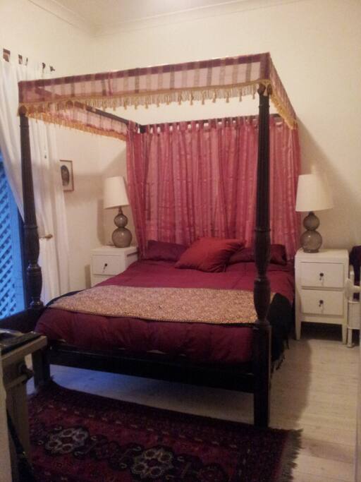 Kingsize antique four poster comfortable bed
