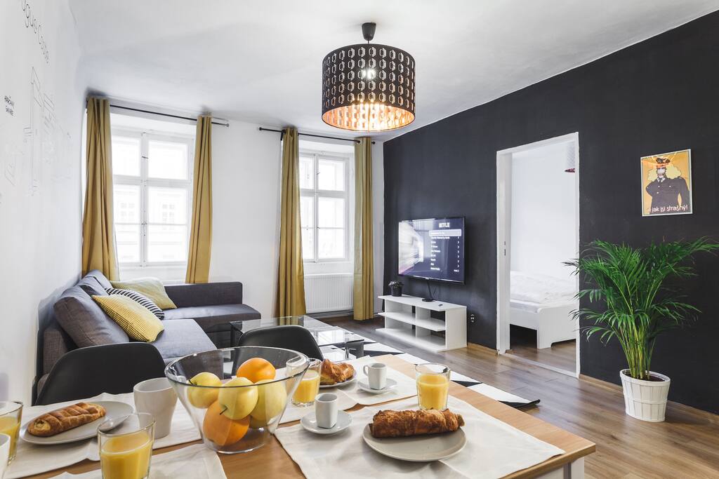 Comfy couch and Prague Castle Map painting