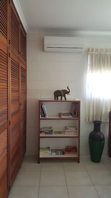Built ins for hanging and storage space with new quiet air conditioner!