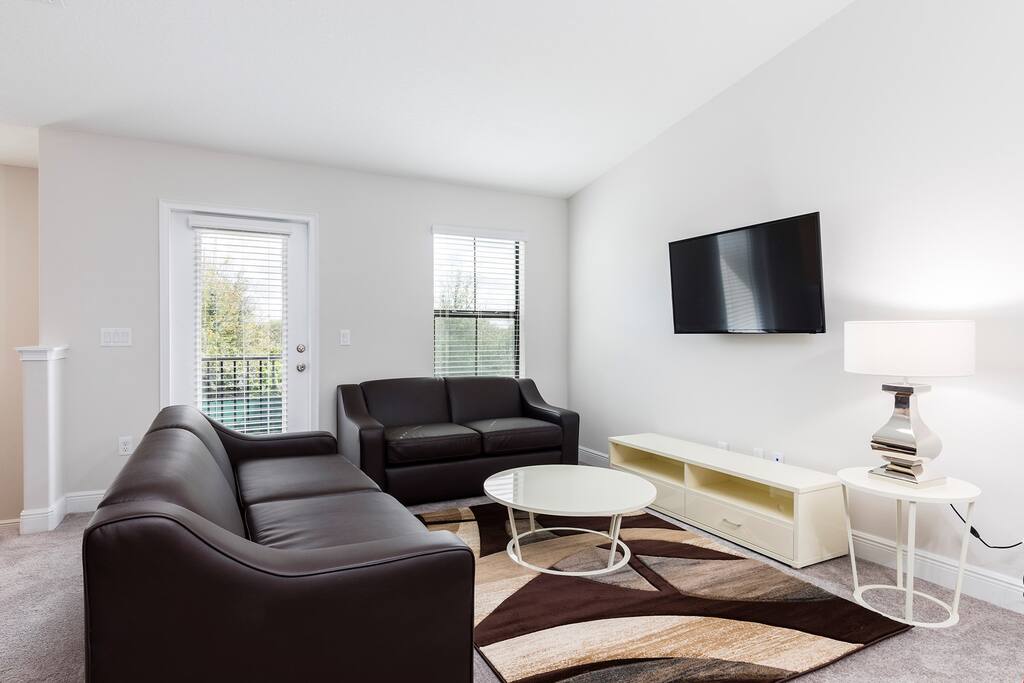 Welcome to our modern and deluxe 2 bedroom townhome in beautiful Haines City!