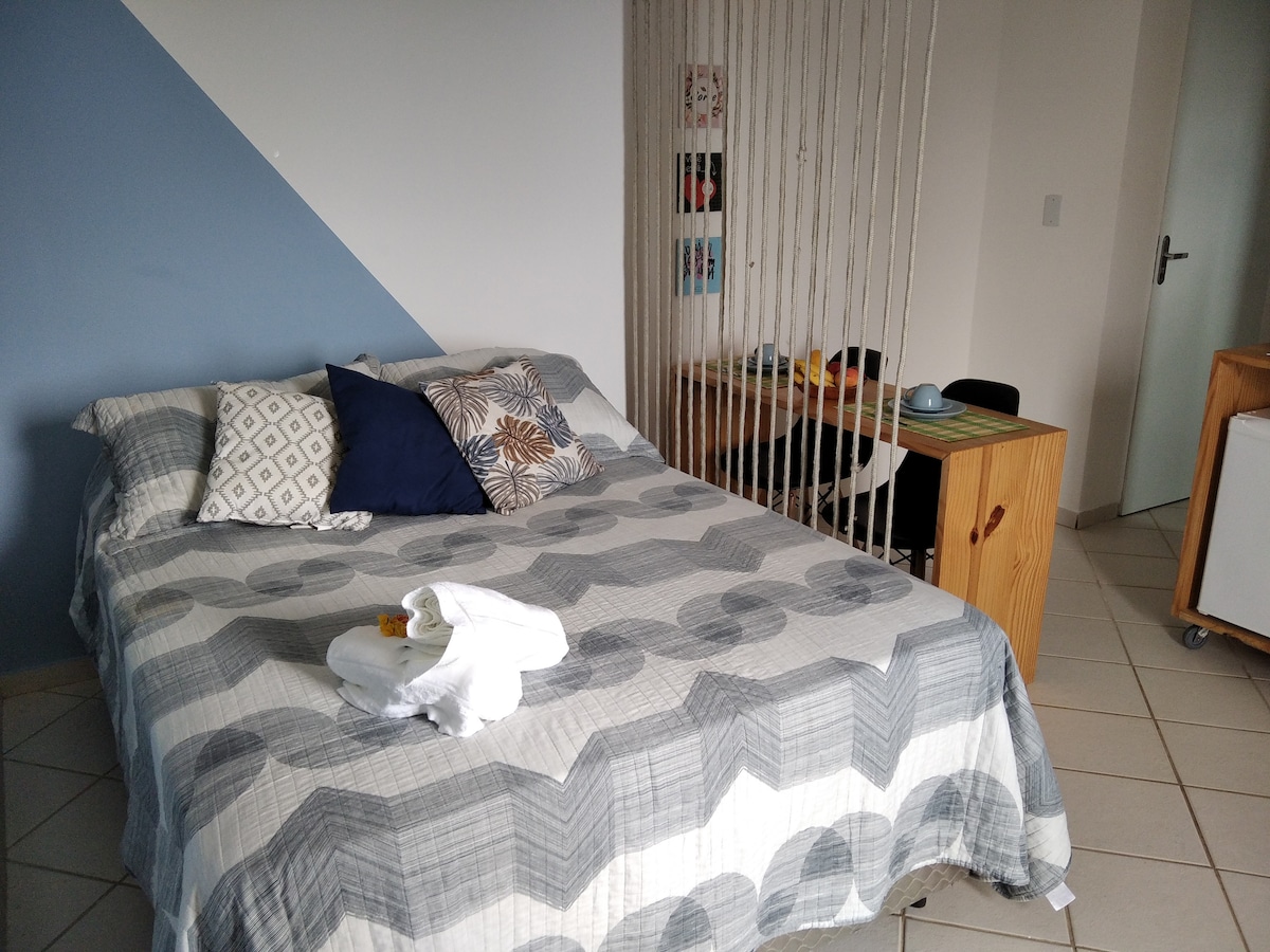 Room space separated from the others by the string curtain!