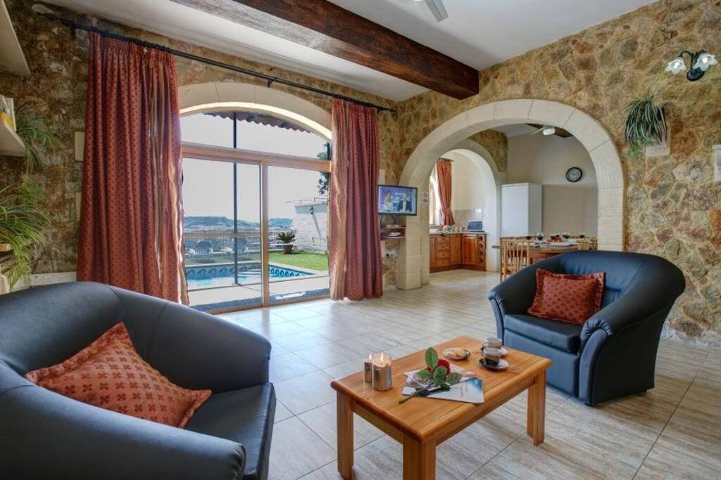 Living, Dining and Kitchen with Pool and Countryside views