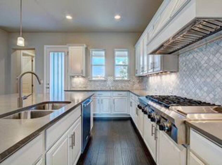 Kitchen leading to back patio.