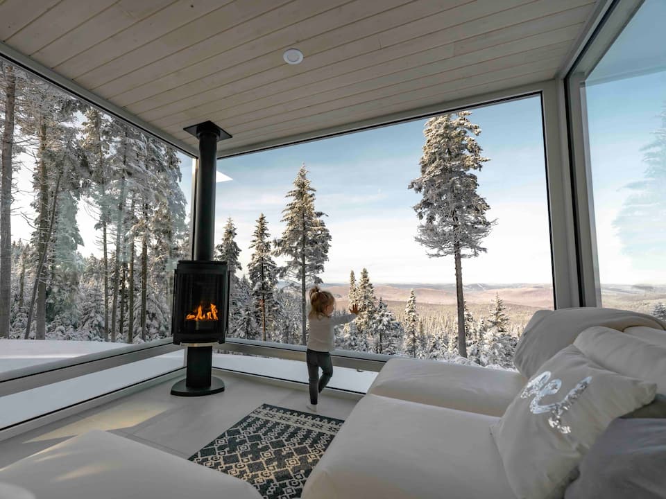 A glass tiny house on a mountaintop near Quebec City, Lac-Beauport, Quebec, Canada, photo 2 of 10