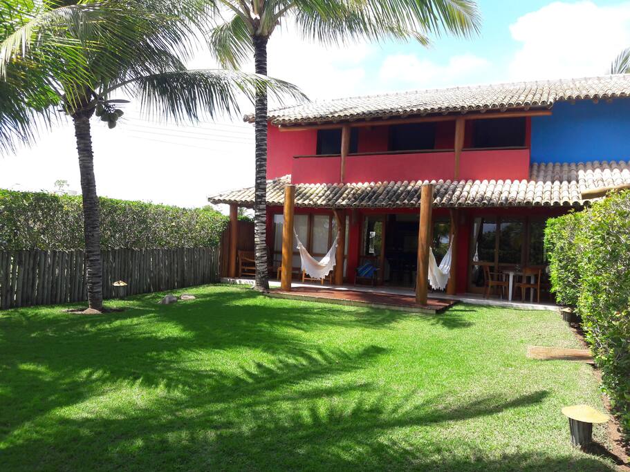 Front yard with coconut trees and shower