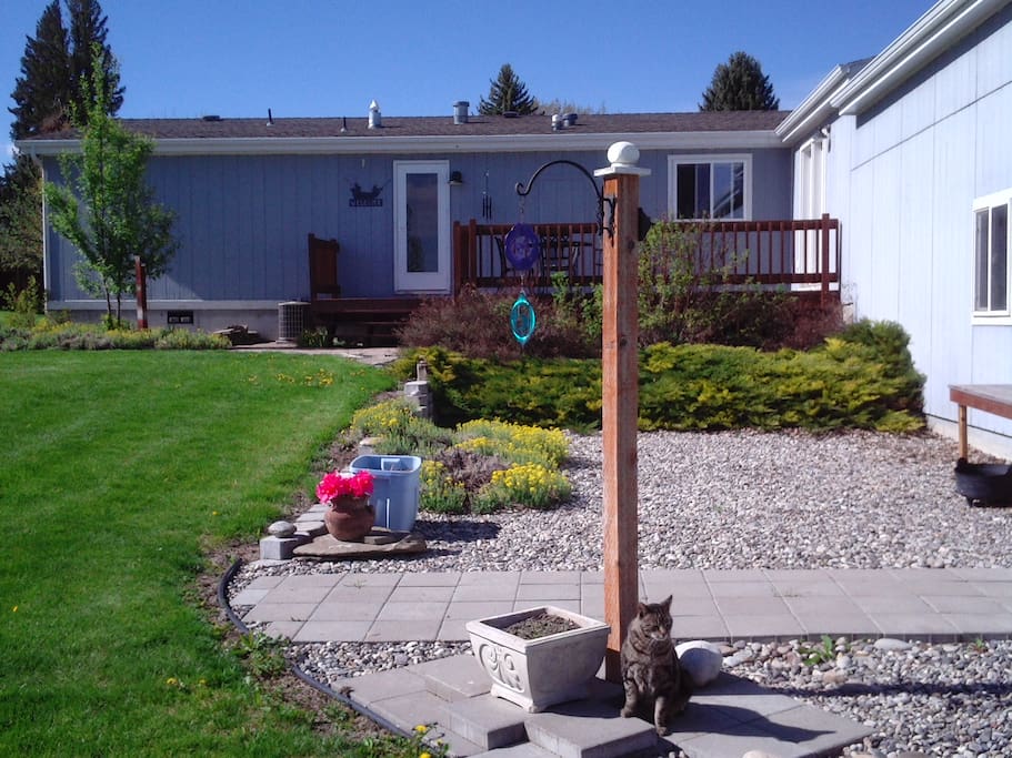 Now that you have walked around the garage doors to the north, you will walk up to the north deck to your private entry door.