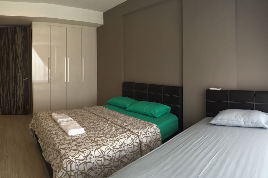 Bed Room 1 : 1 Queen Bed + 1 Single Bed c/w wardrobe