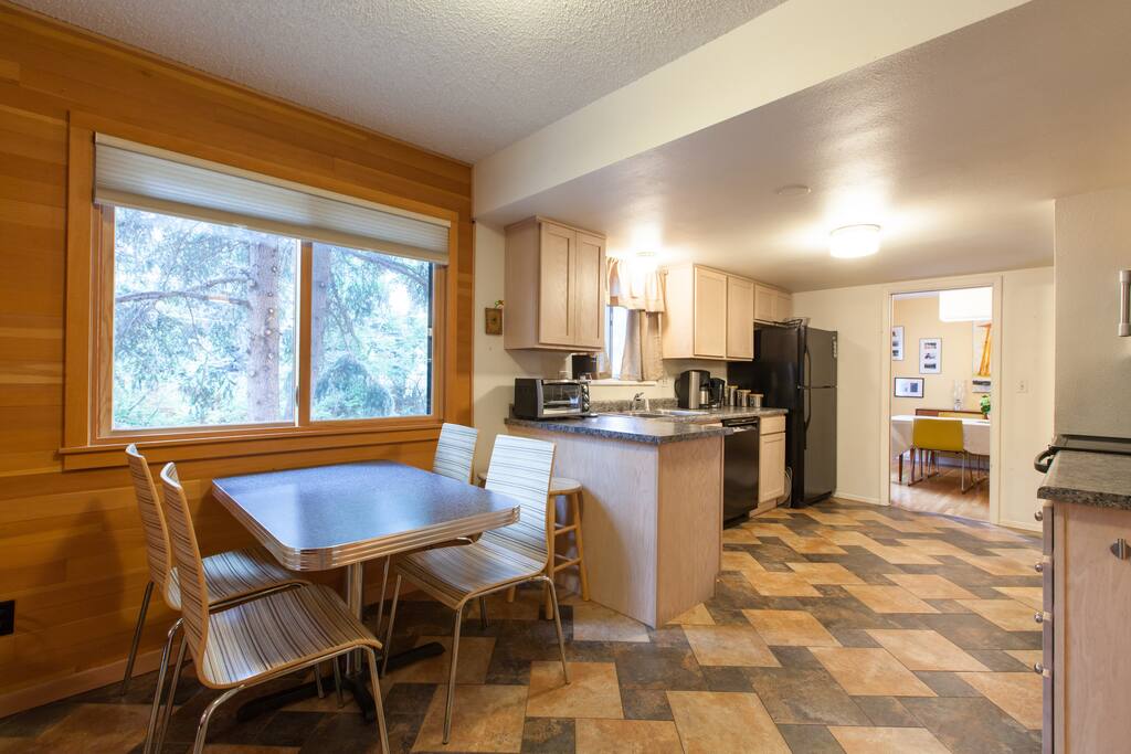 Breakfast nook facing west, bathed in natural daylight.