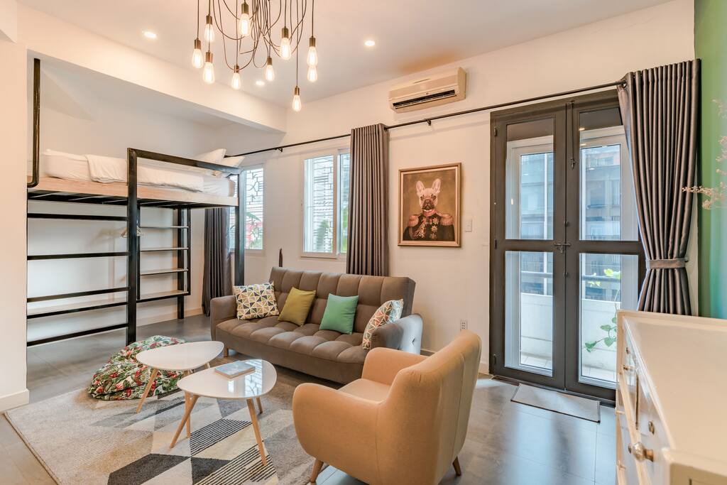 Living room with sofa, armchair and beanbag