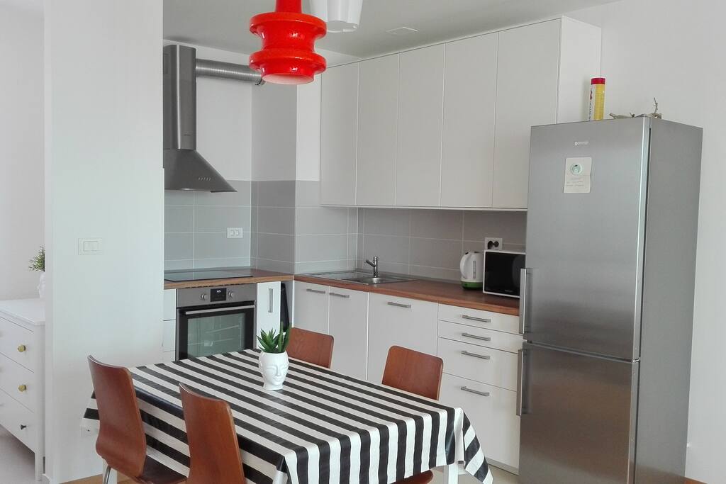 Kitchen with a fully integrated dishwasher incl. tablets