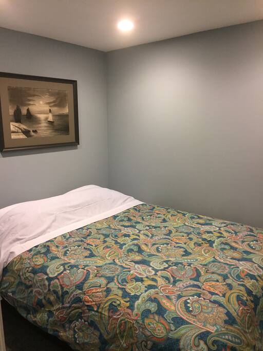 Bedroom with queen size bed.