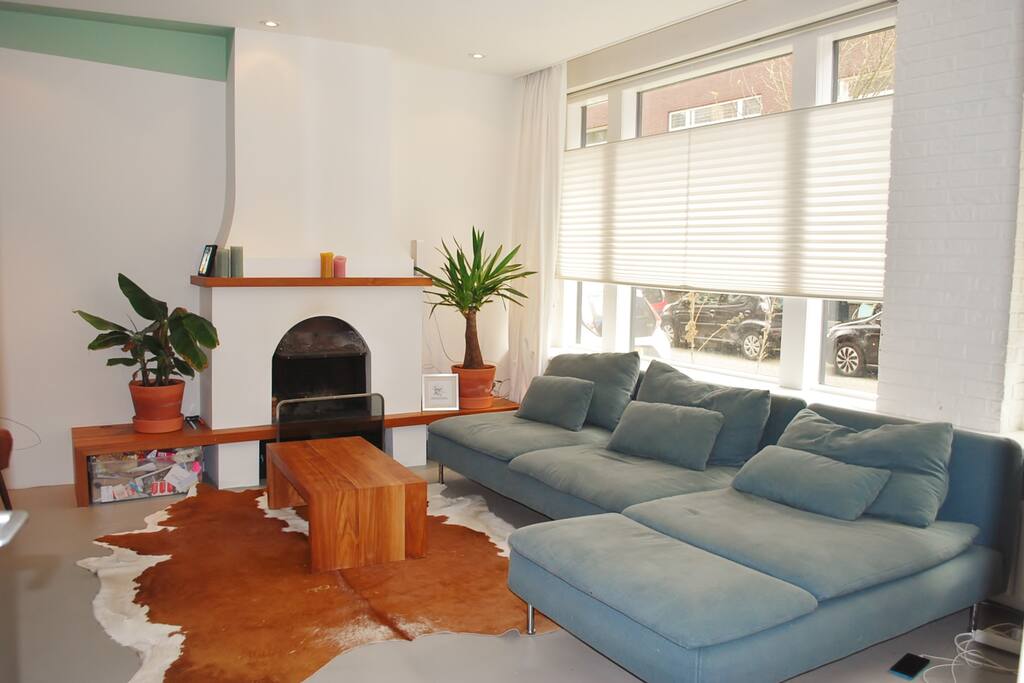 Comfy sofa & fireplace (ground floor)