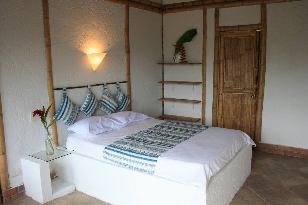 Room with a double bed. We can add 1 extra single mattress.