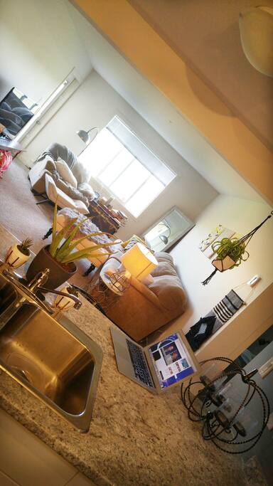 Living room with balcony overlooking the farmland