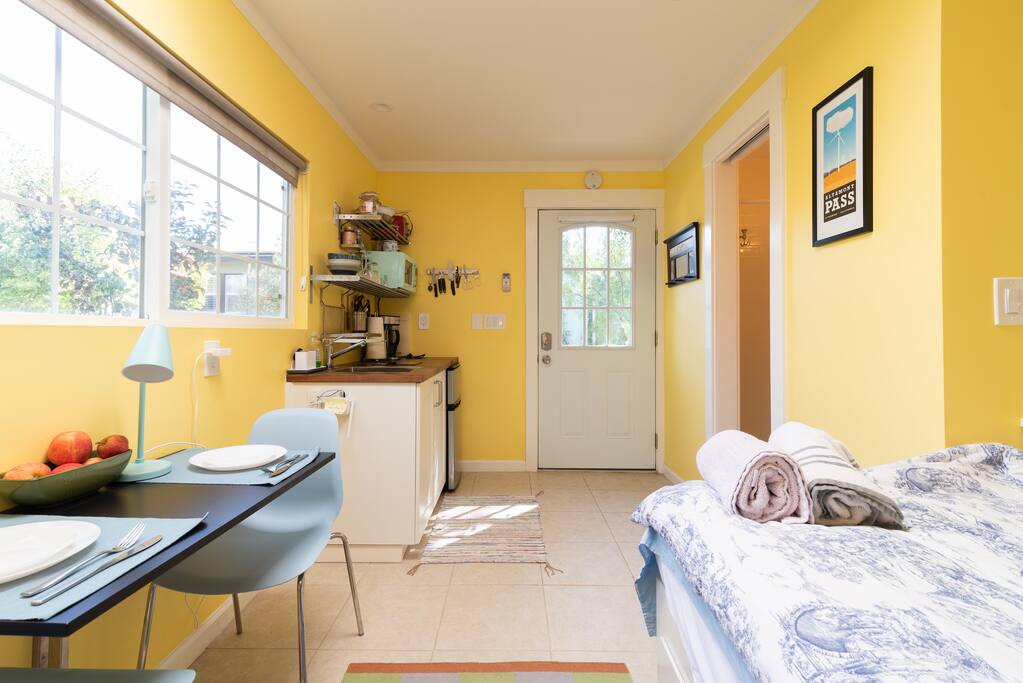 Door is equipped with a retractable privacy screen .