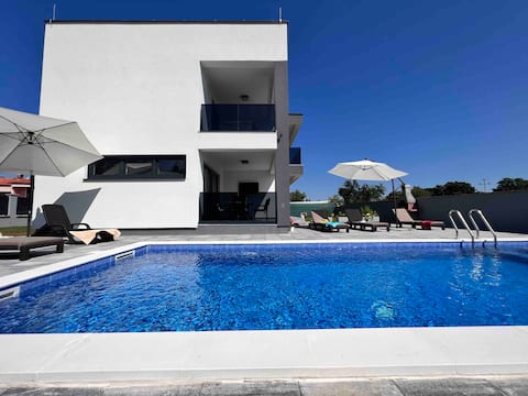 Villa H • Heated Pool Getaway in Labin