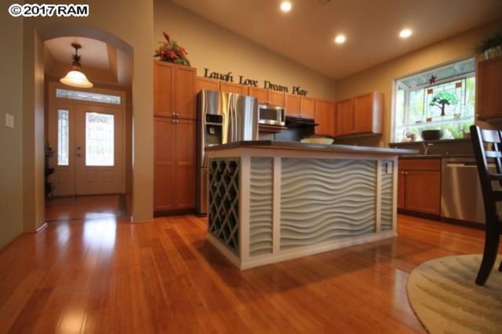Kitchen with island and wine rack