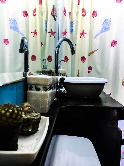 Shared bathroom facility with shower & nice mirrors