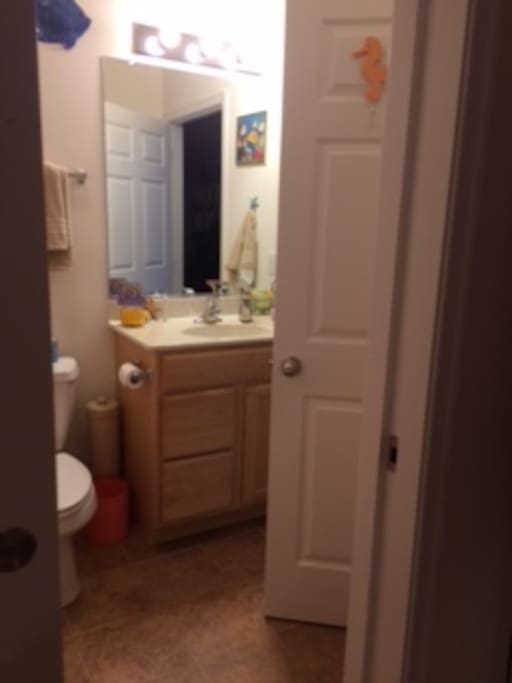 You own private bathroom with shower and tub