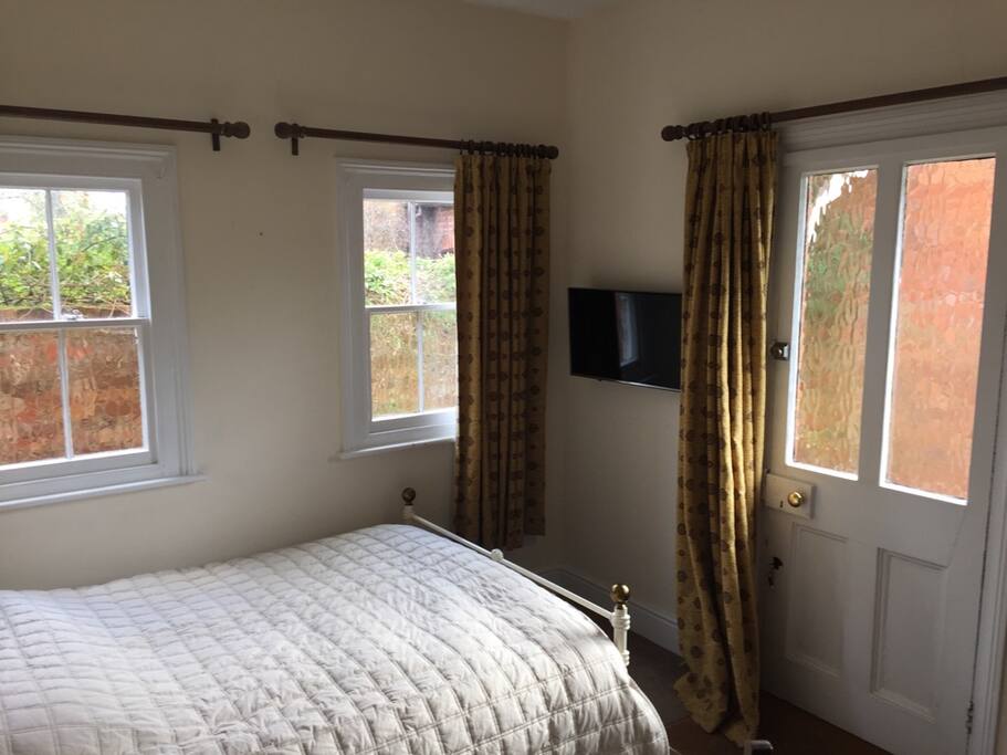 Comfy double bed and television