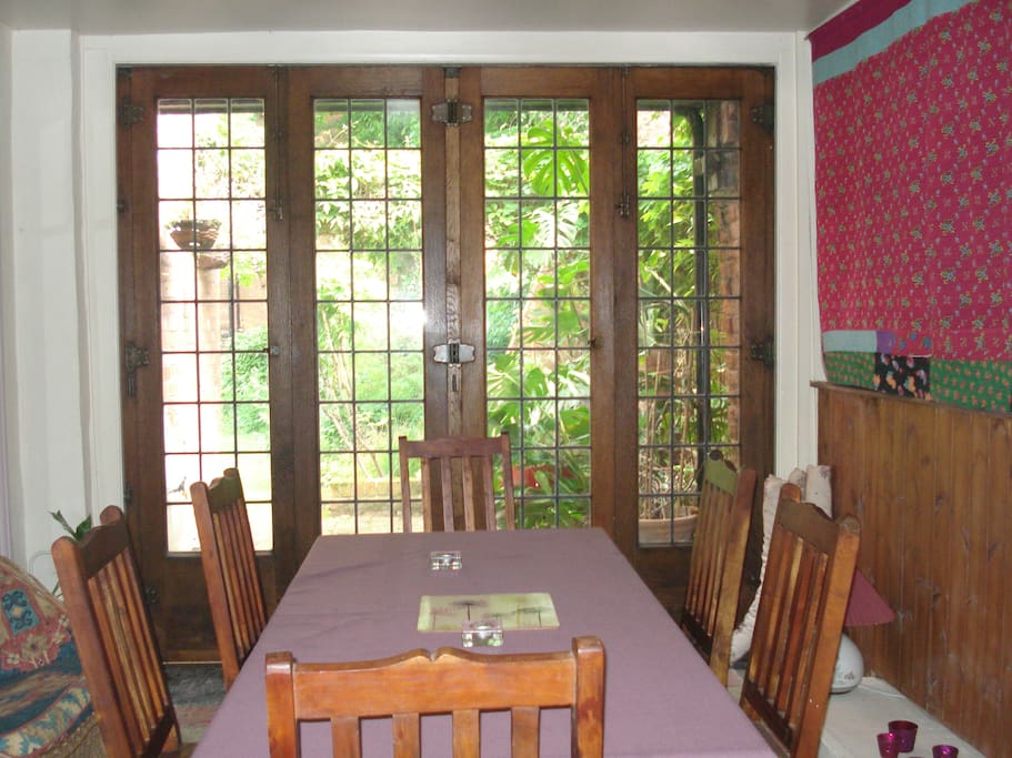 Garden Room leading to patio and side garden. Can seat 6. There is a radiator in the room.