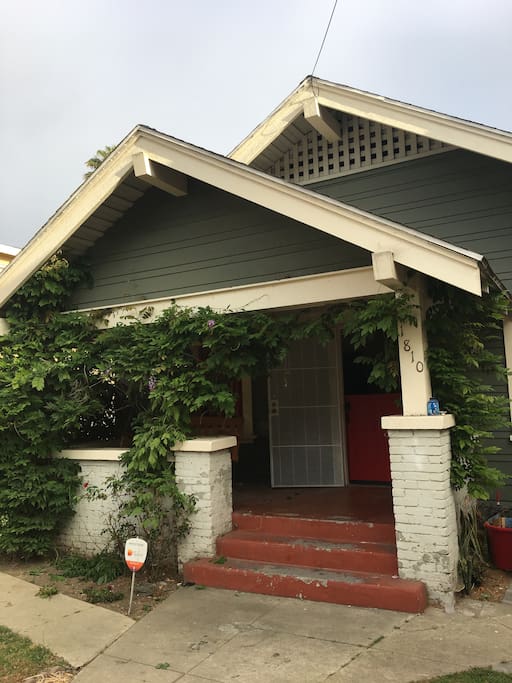 Front porch with swing and dutch door to blend outdoors with the inside