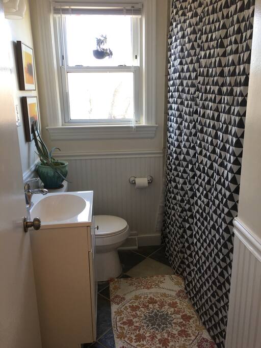 Bathroom with a tub and shower.