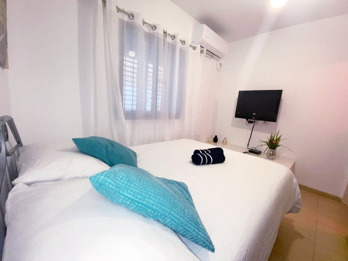 Double bed with brand new high quality mattress in bedroom   and hot cable TV