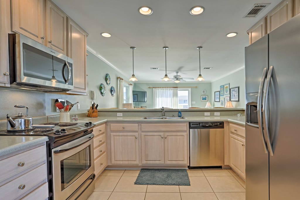 Stainless steel appliances and ample counter space make home-cooking a breeze.