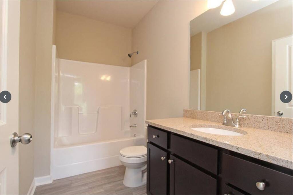 1 full bath and a half bath down stairs. shower curtain included