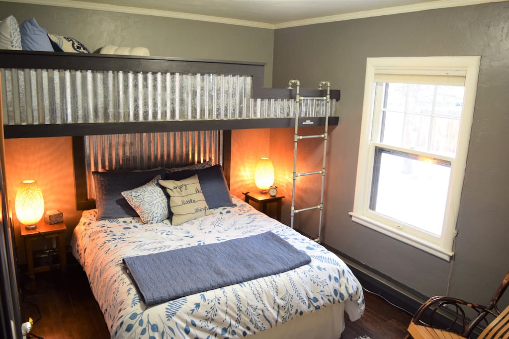 This guest room includes a queen size bed, and cozy twin loft bed above. This room has a closet, dresser, TV, and rocking chair. There is no satellite or cable TV, so bring your device to connect via HDMI, or stream through our Roku device.