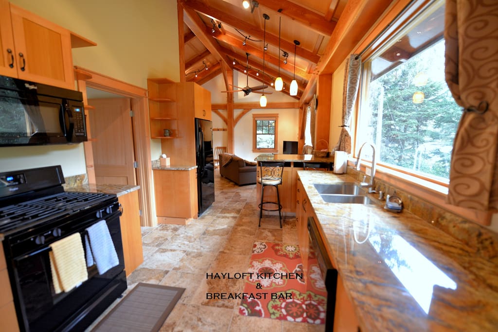 KITCHEN, DINING BAR & LIVING ROOM