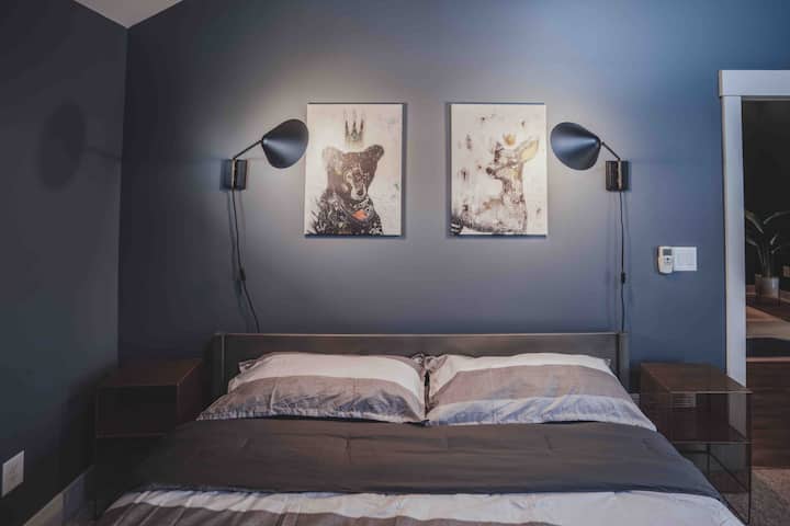 1 of 2 bedrooms on the upper level with super cozy King bed, satellite TV.