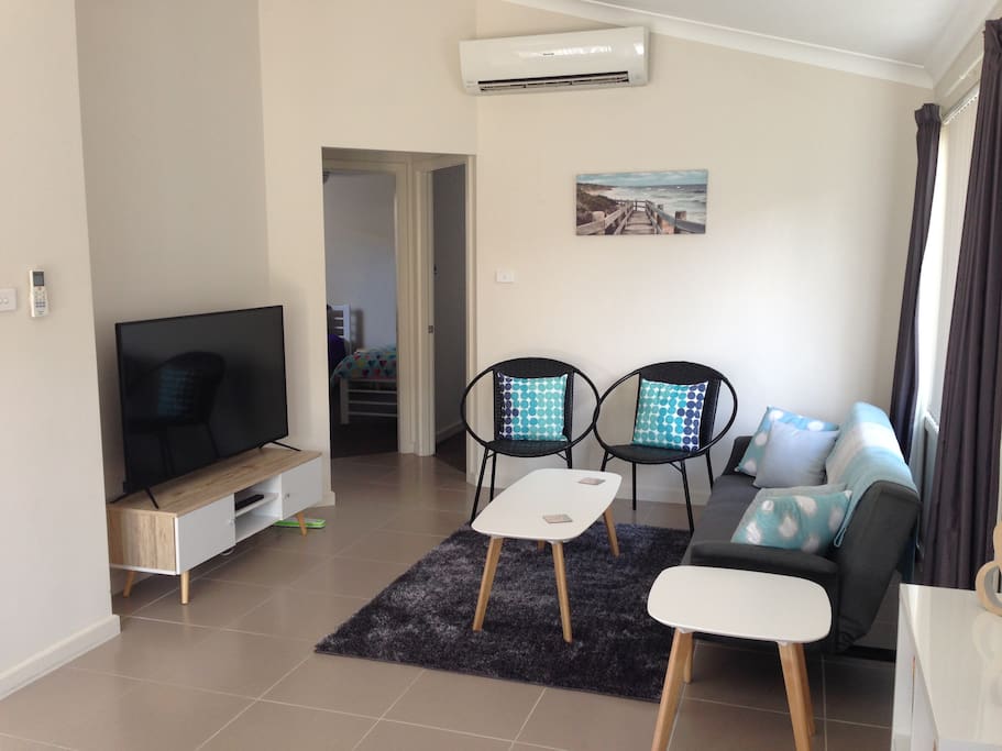 Lounge with HD TV and reverse cycle airconditioning