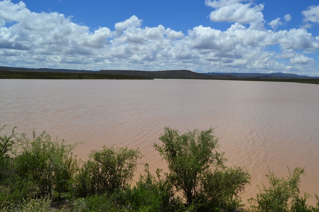 Irrigation dam - for canoeing when full.