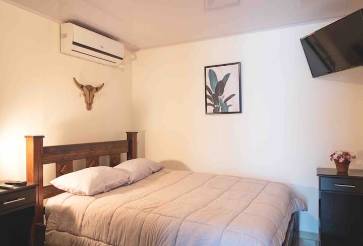 Bedroom #5 with AC and TV.