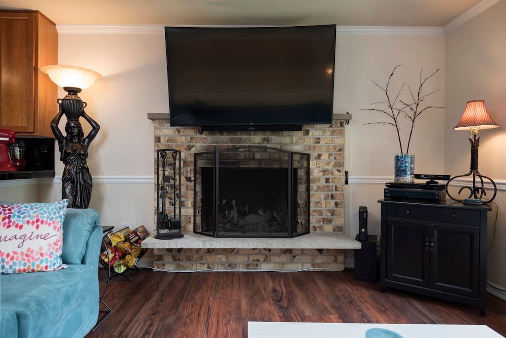 Cozy Fire Place keeps things soft and warm, hard wood floors throughout the home.