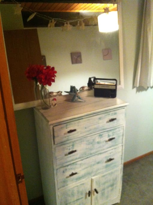 Large mirror & dresser with radio.