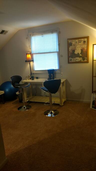 Studio space at top of stairs for quiet time or lap time with coffee.