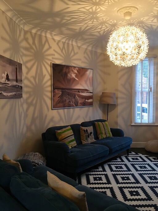 Spacious lounge area with comfy sofas and plenty of books, games, DVD's, X-box & Sky TV