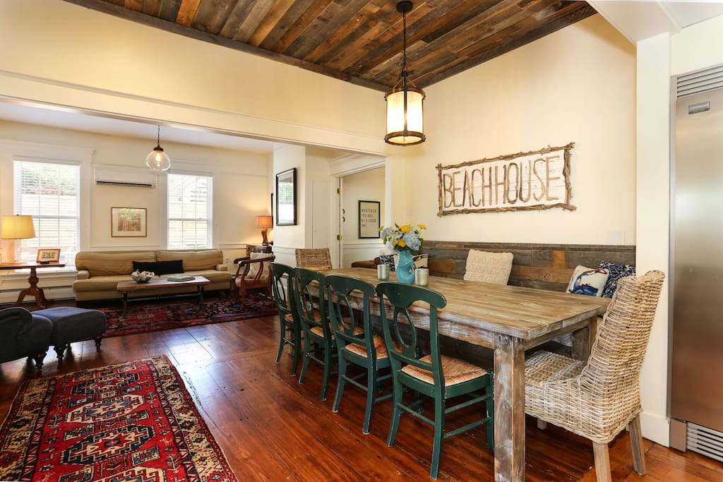 A view of the dining area in the Great Room with the living area beyond