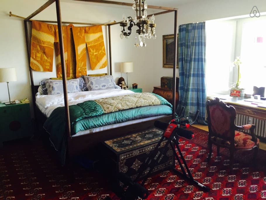 spacious bedroom with direct access to balcony
