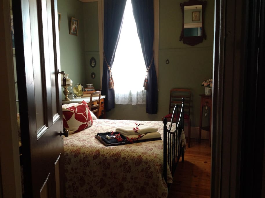 Your bedroom is styled to old world charm overlooking the romantically lit internal courtyard.